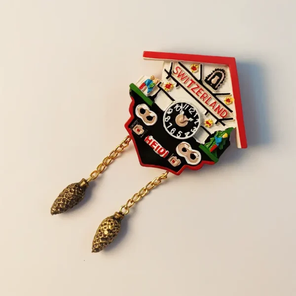 Left side view of Switzerland cuckoo clock fairytale fridge magnet