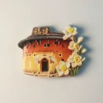 Front view of China Fujian Tulou fridge magnet with Narcissus flower decoration