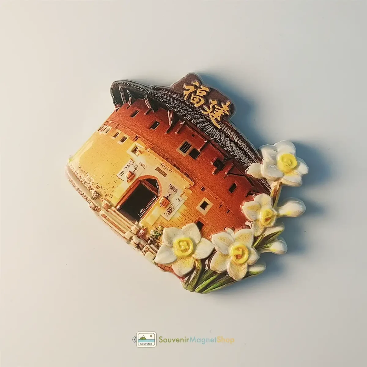 Right side view of unique China Fujian Tulou fridge magnet with Narcissus detail