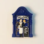 Front view of France Cafe de France waiter fridge magnet, a charming souvenir.
