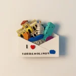 Spain Torremolinos creative landmarks envelope magnet front view.