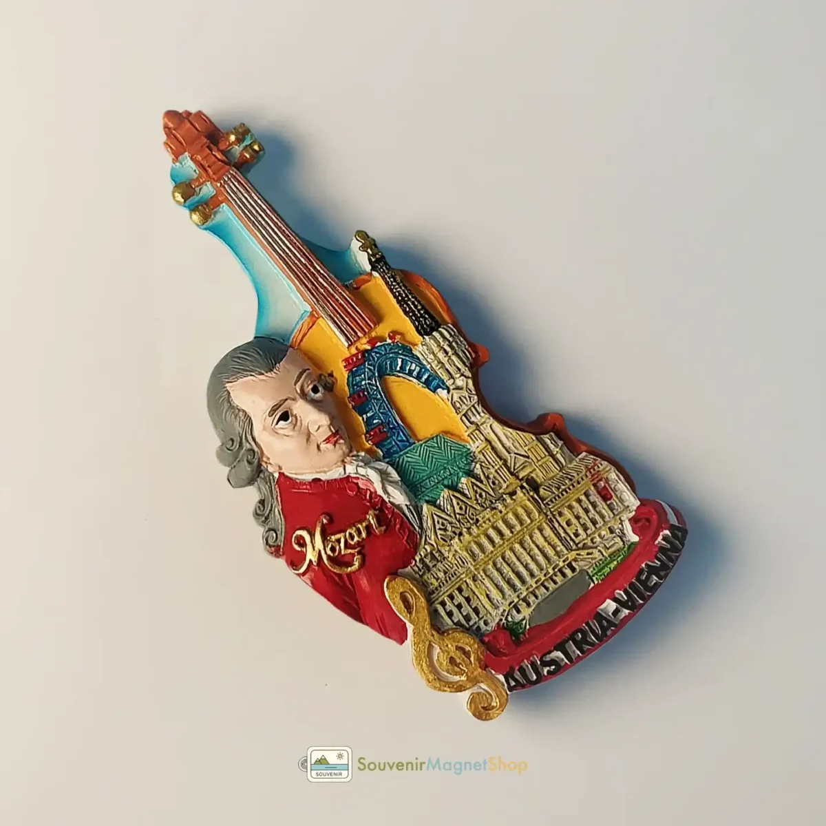 Austria Vienna Mozart violin fridge magnet left side view.