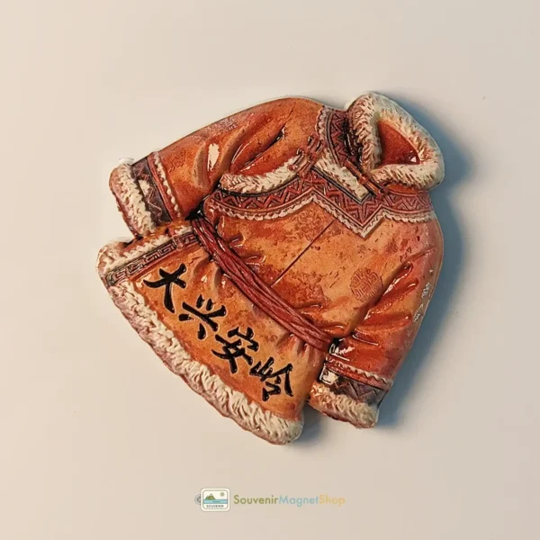 China Daxing'anling traditional clothing fridge magnet right side view.