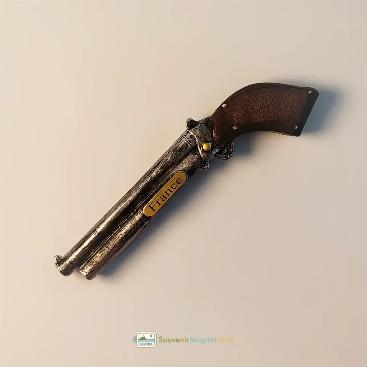 France double barrel flintlock revolver fridge magnet left side view