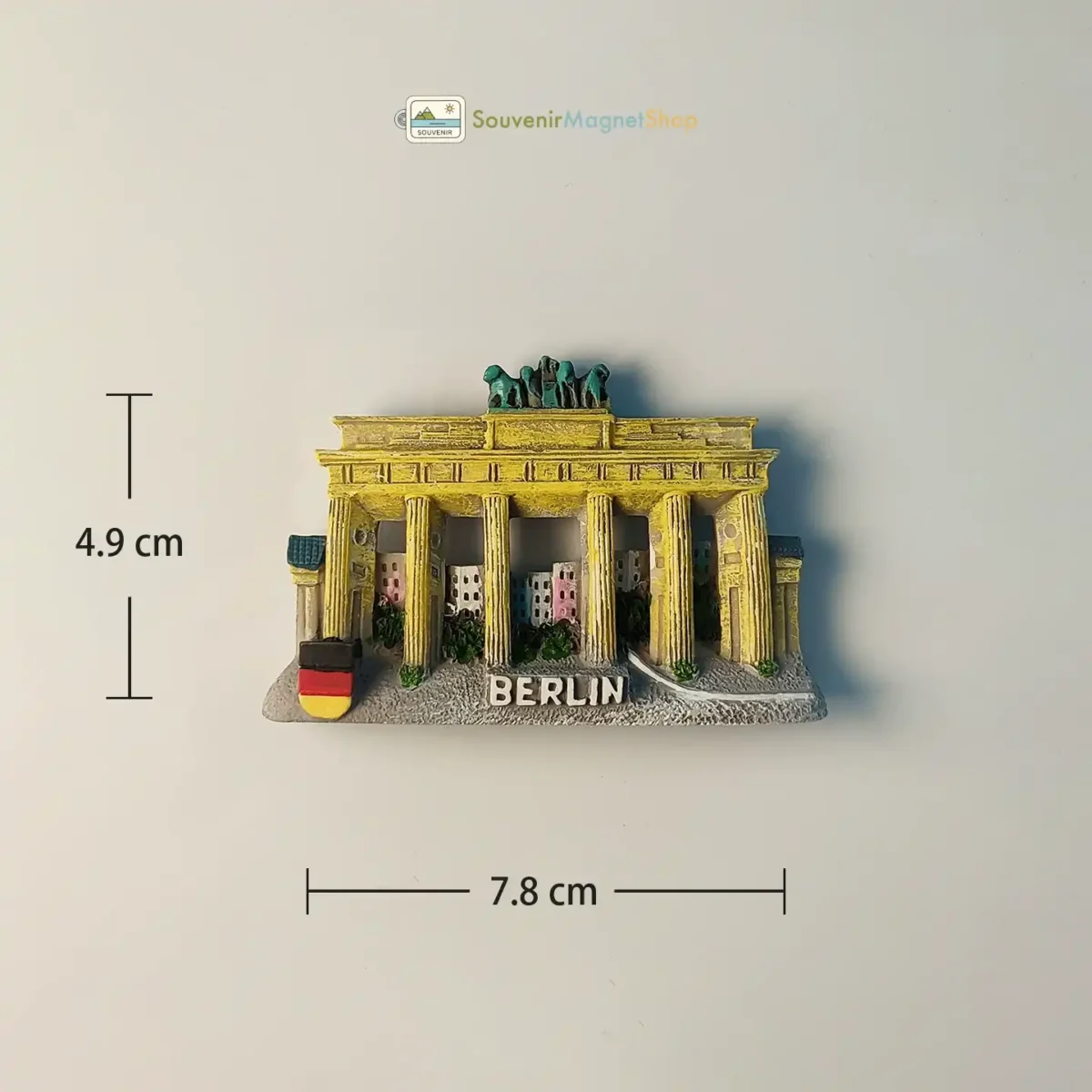 Germany Berlin Brandenburg Gate fridge magnet with size measurements.