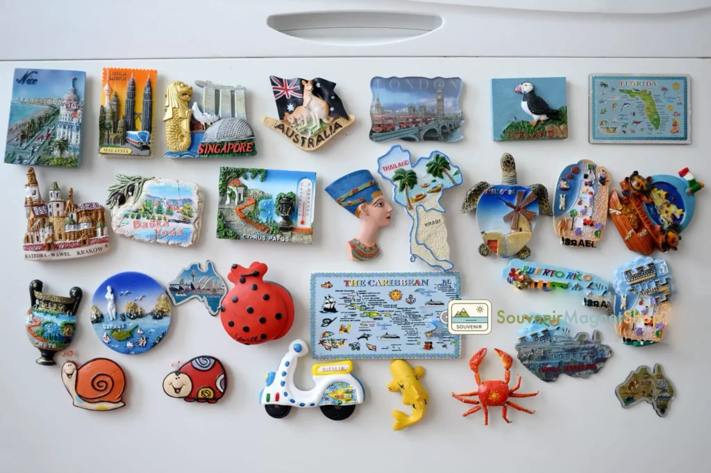 Souvenir magnets displayed on a magnetic whiteboard