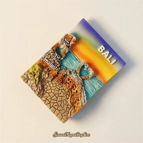 Bali Uluwatu Lover's Cliff travel gift magnet, showcasing the romantic cliffside, ocean, sunset, and "Malini" restaurant in a unique 3D design.