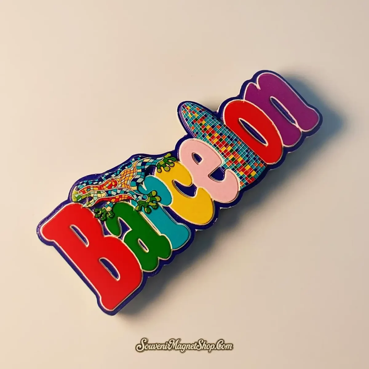 Side view of Barcelona letter magnet showing 3D stereoscopic relief and intricate mosaic textures