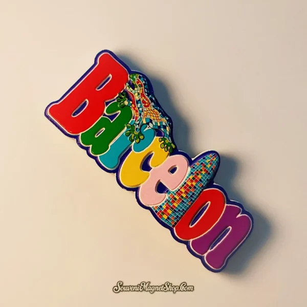 Close-up detail of Barcelona souvenir magnet highlighting hand-painted rainbow colors and lizard craftsmanship