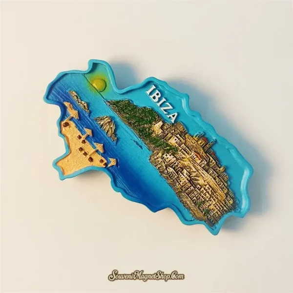 Decorative Ibiza island-shaped travel gift magnet with hand-painted sunset and coastal landscape.