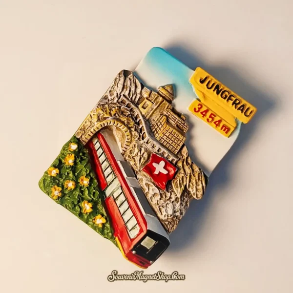 Aesthetic view of the Jungfraujoch High Mountain Railway magnet, ideal as a travel gift, highlighting its intricate design and vibrant colors.