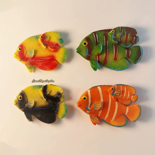 Close-up detail of Maldives Butterflyfish souvenir magnet highlighting hand-painted color craftsmanship