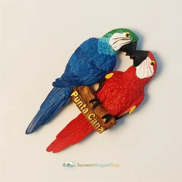 Close-up detail of Punta Cana Couple Macaw souvenir magnet highlighting hand-painted color craftsmanship