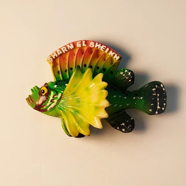 Front view of a vibrant hand-painted lionfish fridge magnet from Sharm El Sheikh, Egypt, featuring 'Sharm El Sheikh' text.