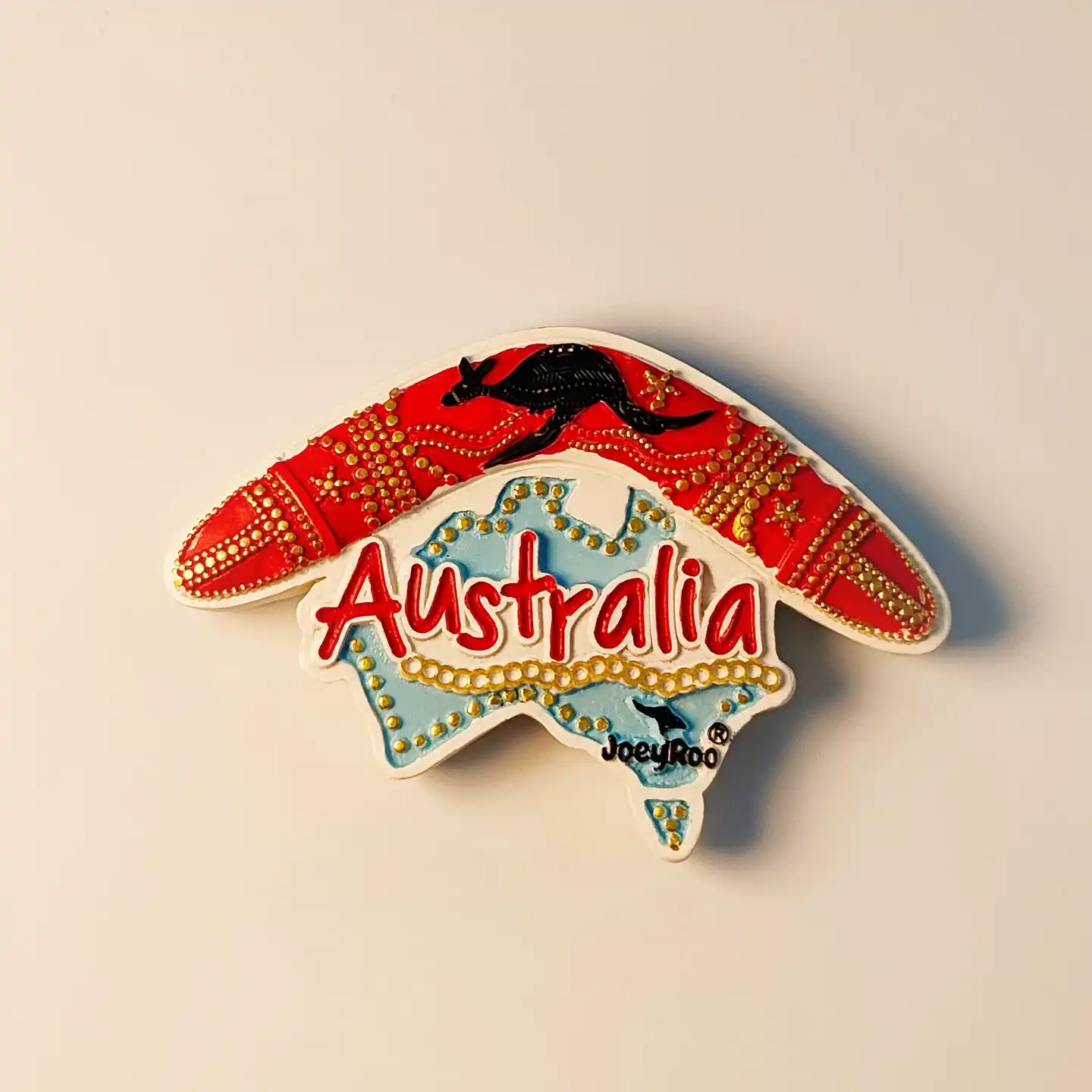 Front view of a 3D Australia fridge magnet featuring a kangaroo, boomerang, and map design.