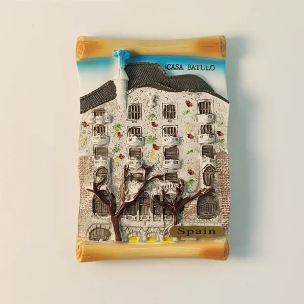 Front view of a 3D scroll fridge magnet featuring Barcelona's iconic Casa Batlló with intricate details.