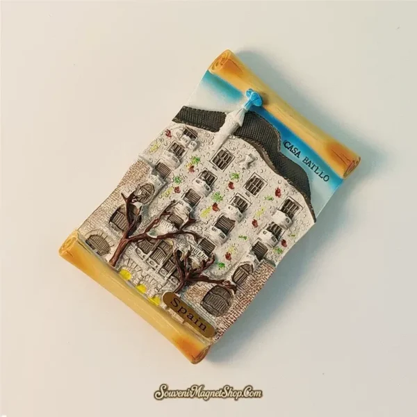 Casa Batlló travel gift magnet from Spain, presented in a creative scroll frame, perfect for collectors.