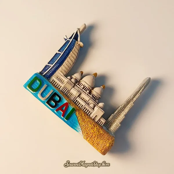 A high-quality Dubai travel gift magnet showcasing the city skyline against a turquoise sea and golden sand.