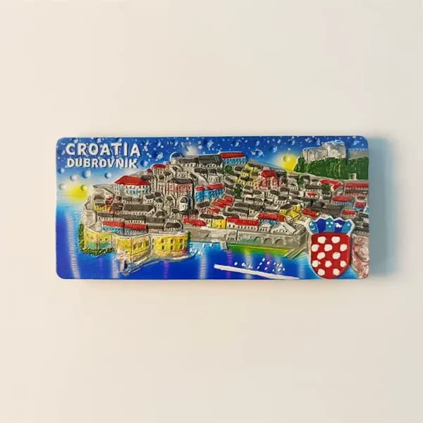 Front view of a detailed Dubrovnik Old Town cityscape fridge magnet, showcasing its vibrant red roofs and ancient stone walls by the Adriatic Sea.