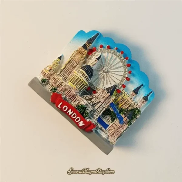 Angled close-up of a London travel gift magnet, showcasing detailed 3D Big Ben, London Eye, and Tower Bridge.