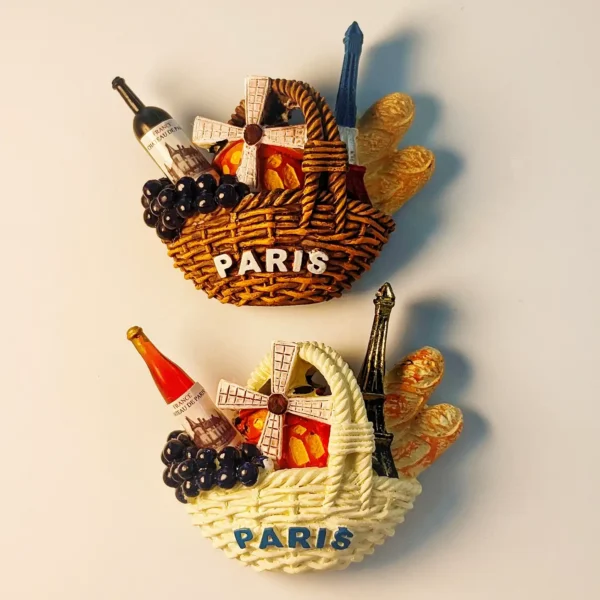 Front view of Paris 3D fridge magnet featuring the Eiffel Tower, Moulin Rouge windmill, and a French gourmet basket.