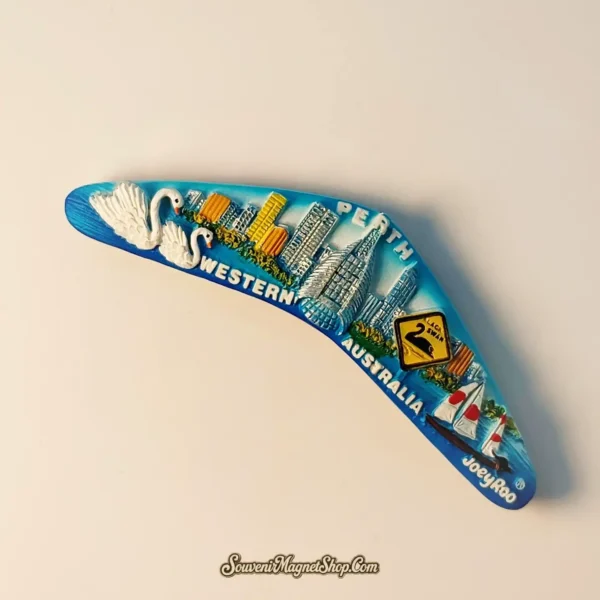 Unique Perth, Australia travel gift magnet in a boomerang design, with vibrant depictions of swans and the city.