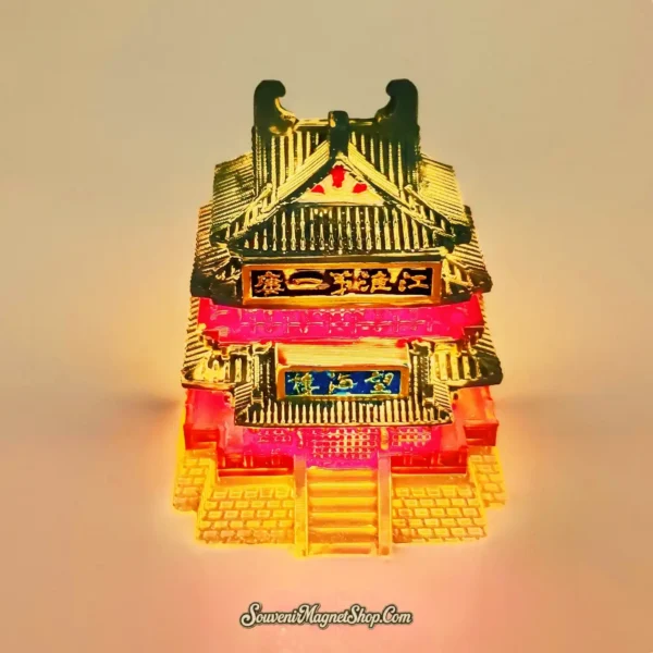 Illuminated Taizhou Wanghai Tower souvenir magnet glowing with warm light, highlighting its intricate architectural details and unique light-up feature.