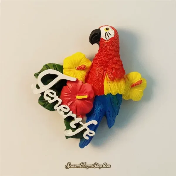 Artistic close-up of the Tenerife tropical parrot and hibiscus magnet, highlighting its appeal as a unique travel gift.