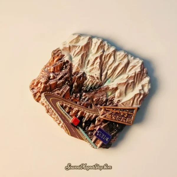 Travel gift magnet featuring the iconic Pamir Highway G314 National Road in Xinjiang, China.