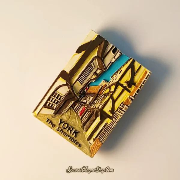 High-angle view of the York Shambles fridge magnet highlighting the textured 3D craftsmanship of the Tudor buildings.