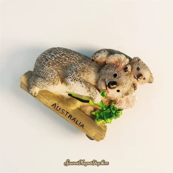 Australia koala fridge magnet left-back angle showing baby koala clinging to mother's back and fur texture detail