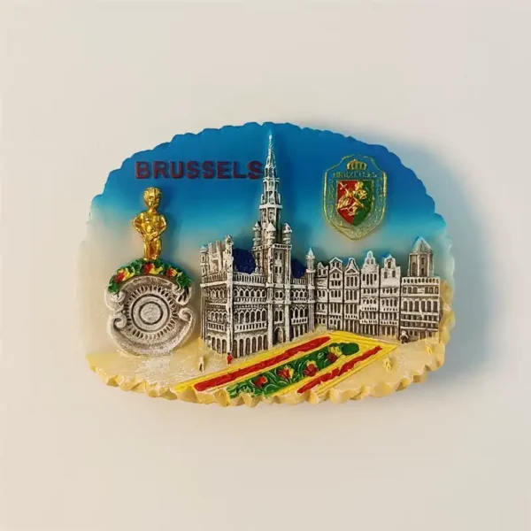 Front view of a 3D Brussels Grand Place souvenir fridge magnet, showcasing the intricate details of the Town Hall, guild houses, and Manneken Pis.