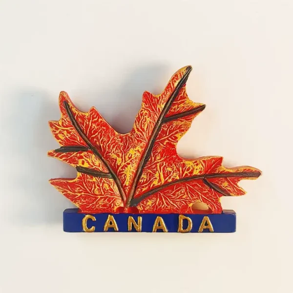 Canada souvenir fridge magnet front view with 3D resin autumn maple leaves in red gold and blue CANADA base