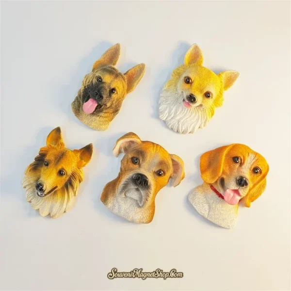 Five funny dog breed fridge magnets displayed together showing lifelike resin sculpted faces