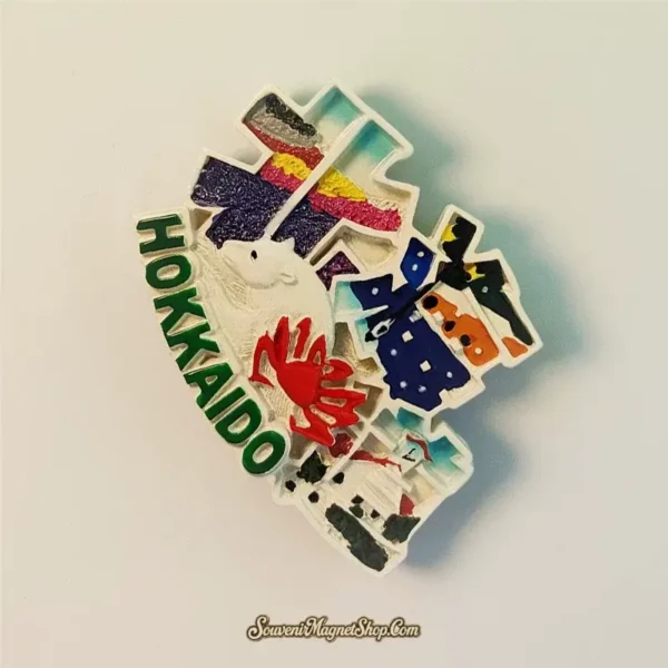 Hand-painted Hokkaido travel gift magnet depicting a polar bear and king crab, an ideal present for collectors.