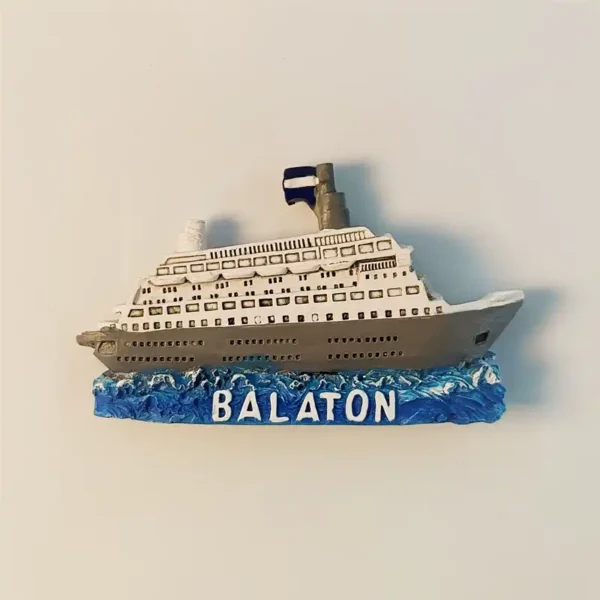 Hungary Lake Balaton cruise ship fridge magnet side view, white multi-deck resin ship on blue wave base with BALATON lettering