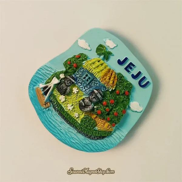 Unique Jeju Island travel gift magnet with a 3D design of a thatched house, Dol Hareubang, and island landscape.