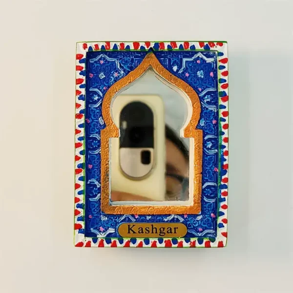 Front view of Kashgar souvenir fridge magnet with deep blue arabesque tile border, gold arch frame and mirror insert