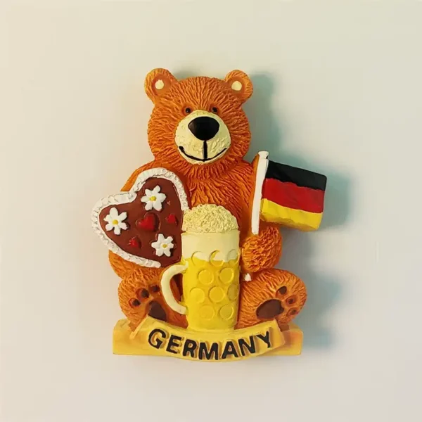 Front view of Munich beer bear fridge magnet with German flag, beer stein, and gingerbread heart.