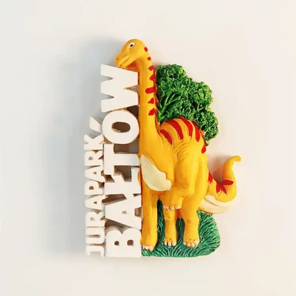 Poland JuraPark Baltow souvenir fridge magnet front view with 3D resin yellow brachiosaurus green foliage and BALTOW lettering