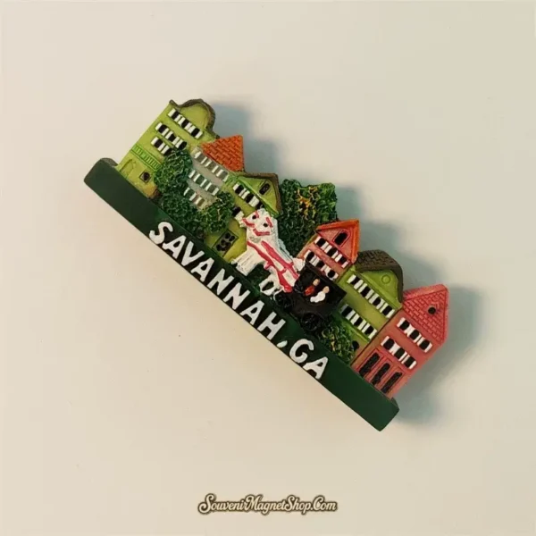 Side perspective of a Savannah, GA travel gift magnet showcasing the intricate details of its historic buildings and a horse-drawn carriage.