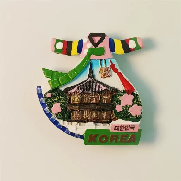 Front view of a 3D Hanbok dress shaped fridge magnet featuring Gyeongbokgung Palace in Seoul, South Korea, with vibrant colors.