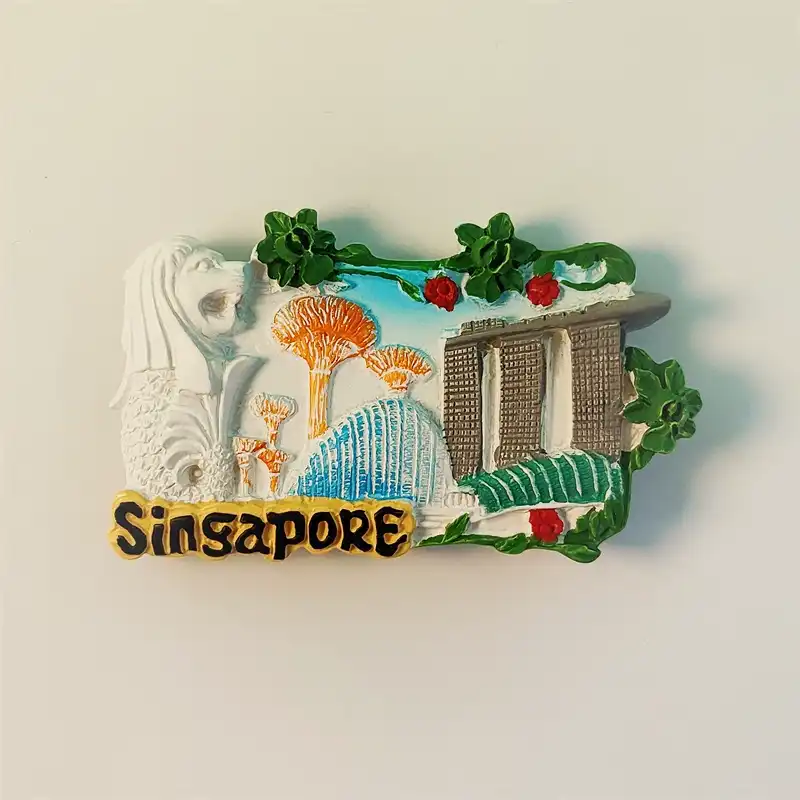 Front view of a Singapore fridge magnet featuring Marina Bay Sands and Merlion Fountain.