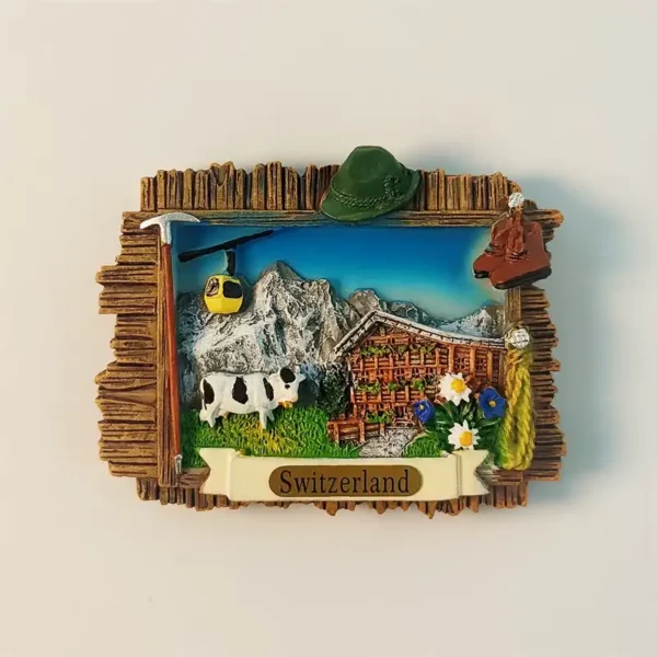 3D Switzerland Alps Jungfrau fridge magnet with wood-style frame and hiking elements.