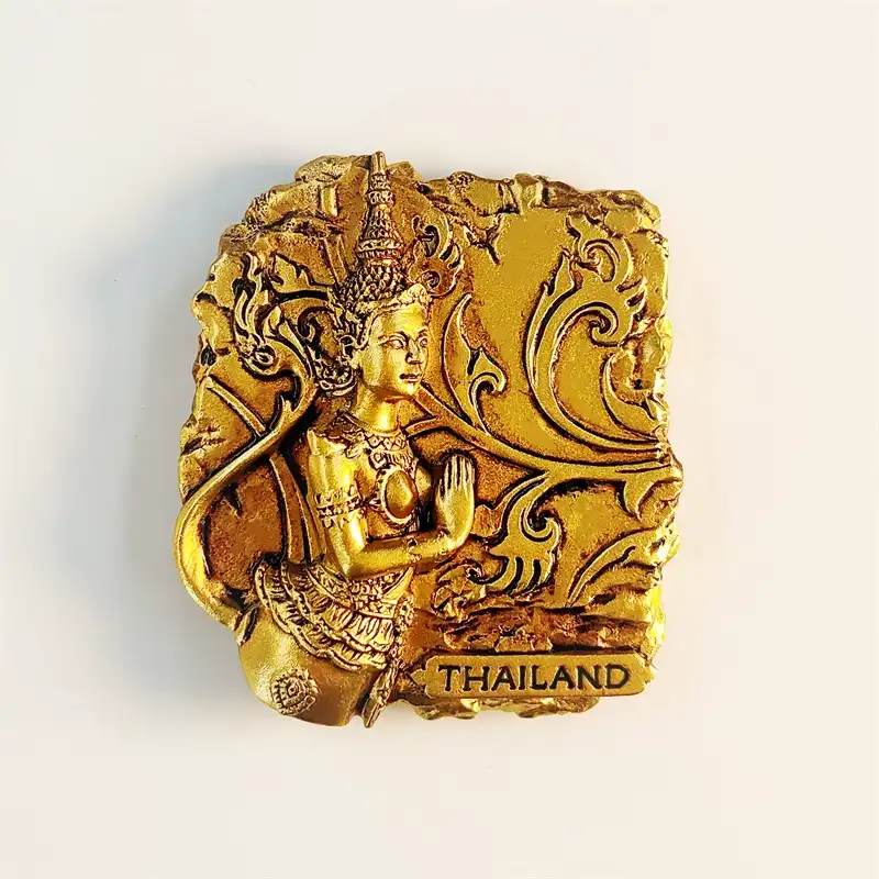 Thailand golden goddess souvenir fridge magnet front view with Thai Theppanom angel in prayer pose