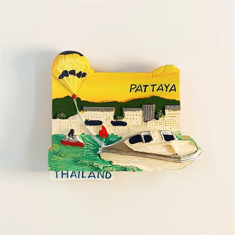 thailand-pattaya-beach-fridge-magnet-front Thailand Pattaya souvenir fridge magnet front view with 3D resin parasailing speedboat golden sunset and resort skyline