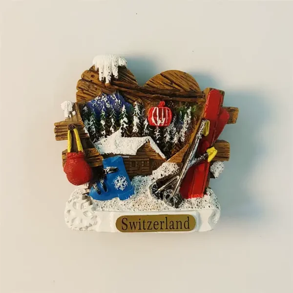 3D Switzerland Zermatt ski resort fridge magnet featuring miniature skis, boots, and a snowy cabin.