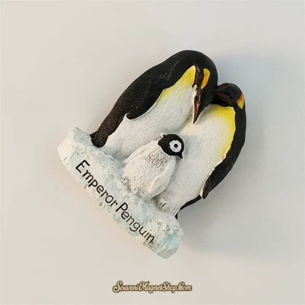 Emperor penguin family fridge magnet side angle view showing 3D penguin sculpture detail