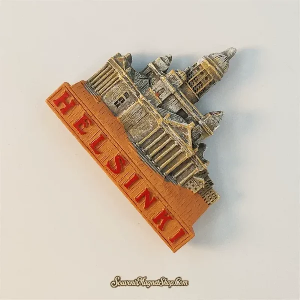 Side angled view of Finland Helsinki Cathedral souvenir magnet showing dome columns and 3D depth