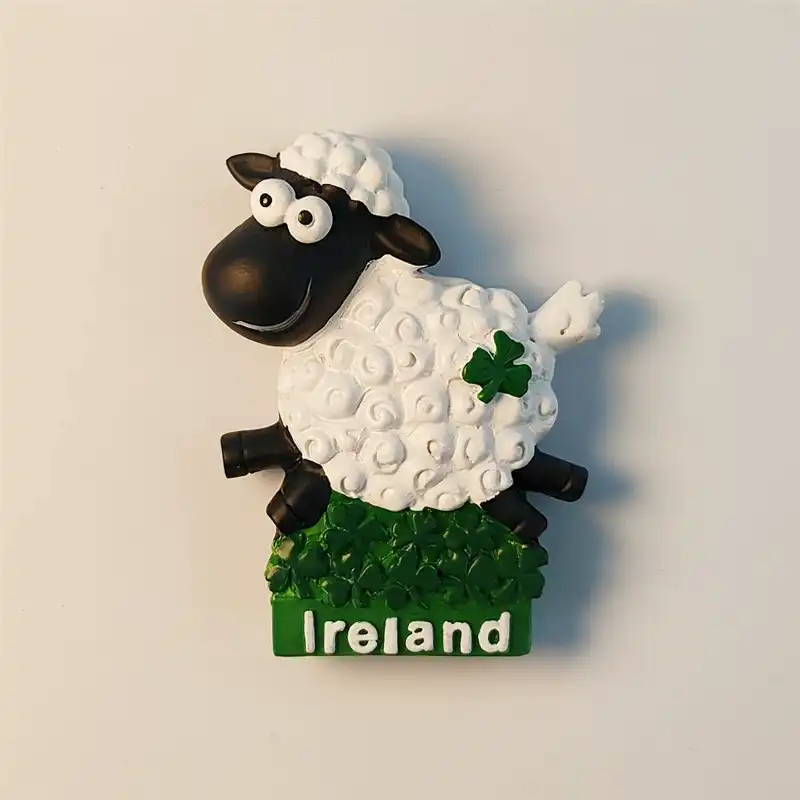 Front view of Ireland Belfast cartoon sheep fridge magnet with hand-painted shamrock and clover base